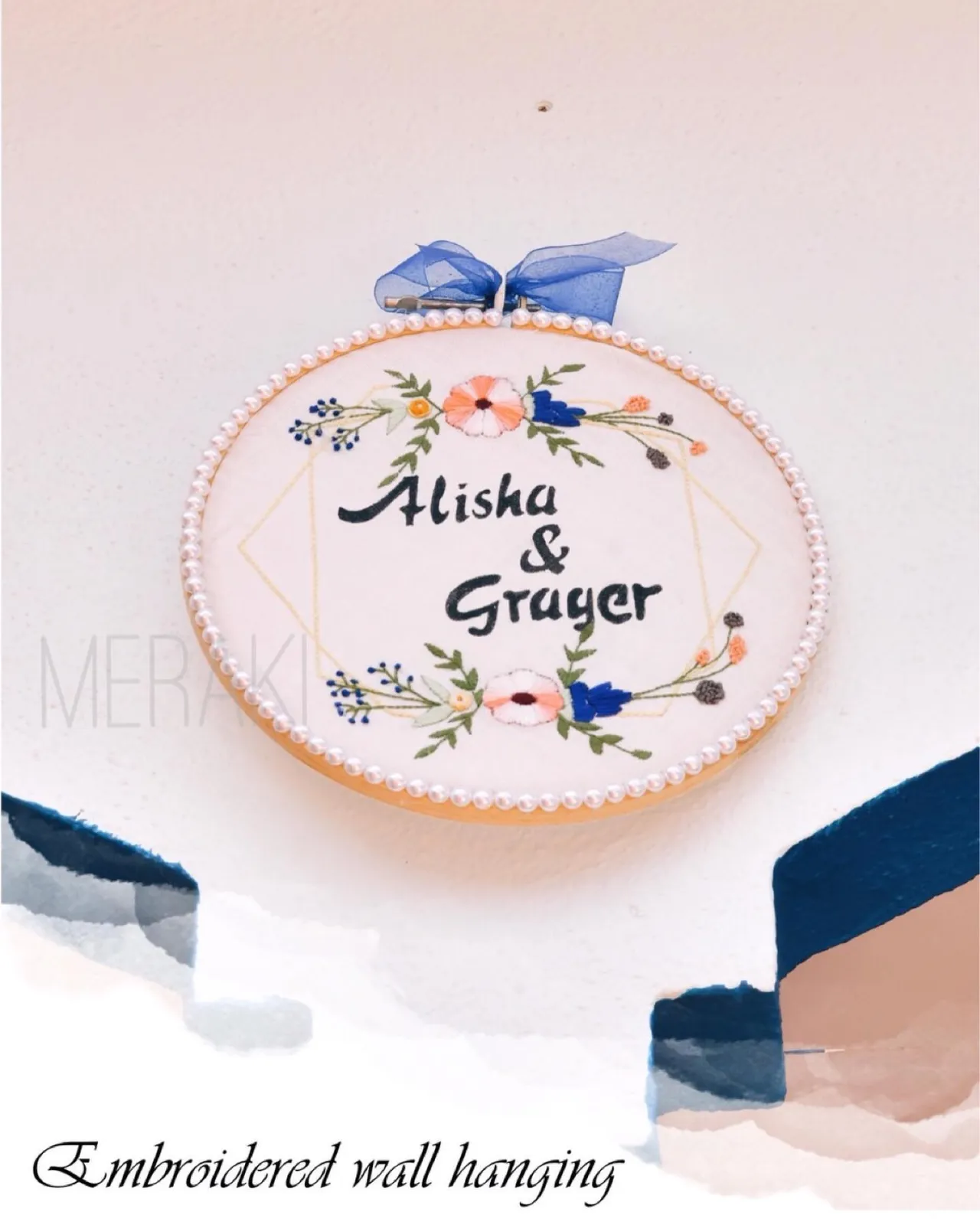 Embroidered Wall hanging adorned with white pearls